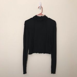 And now this Black long sleeve top size L